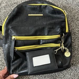 Steve Madden Logo Embossed Black Neon Zipper Backpack.